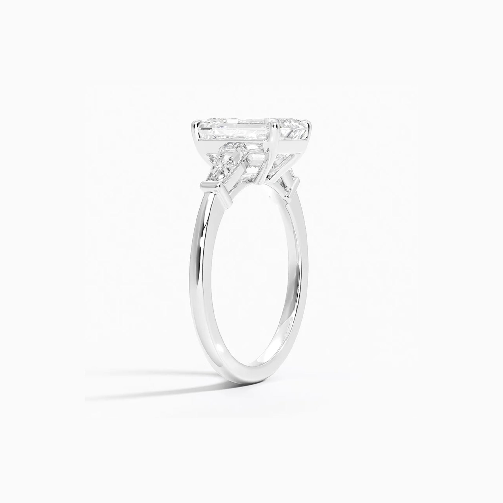 <b>Build Your Own</b> <br>Whispers of Forever: Emerald Trio Engagement Ring<br>